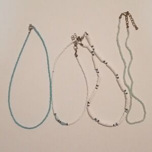 #794.  4 Piece Assorted Glass Seed Bead And Shell Blue Necklace Bundle